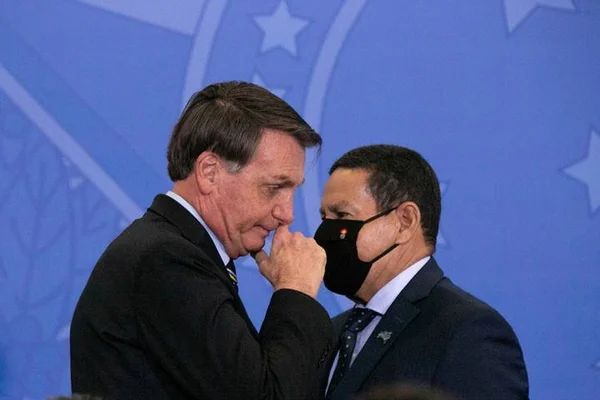 O presidente Jair Bolsonaro e o vice, Hamilton Mourão