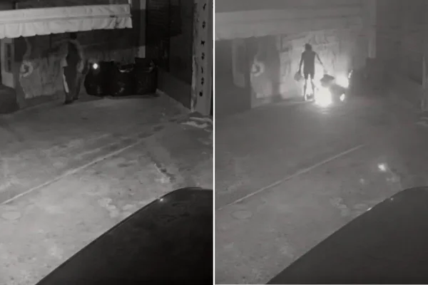 Imagem colorida mostra homem ateando fogo em mulher em situação de rua. Metrópoles