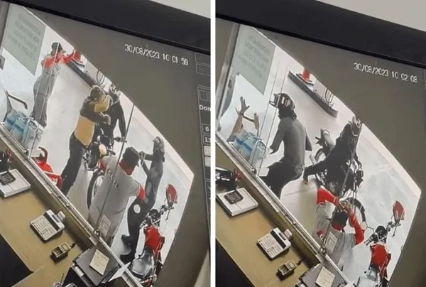 Imagem colorida registrada por câmera do momento em que assaltantes abordam as vítimas - Metrópoles