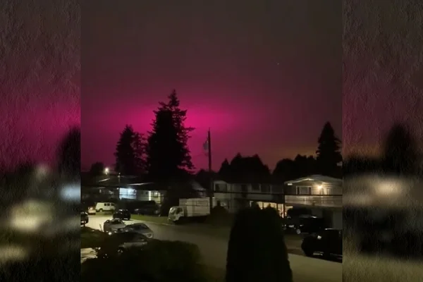 Imagem colorida mostra Céu de cidade canadense fica rosa por causa de estufa de maconha - Metrópoles