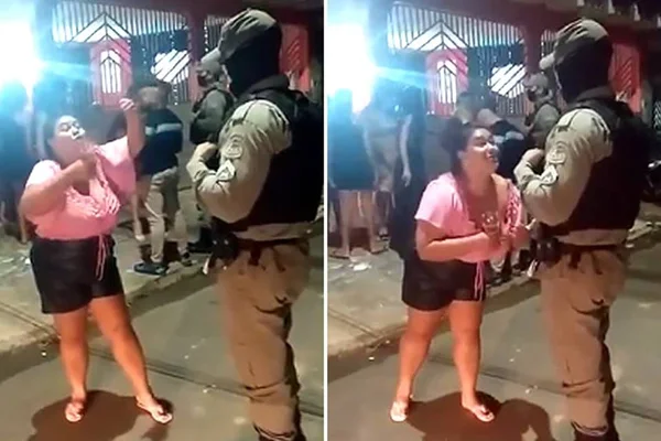 Mulher canta Seu Polícia para militar
