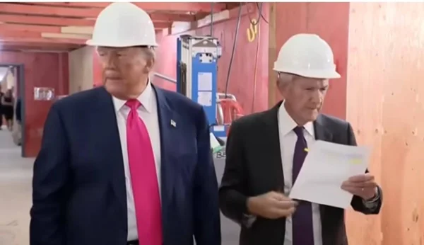 imagem colorida trump e powell discutem fed