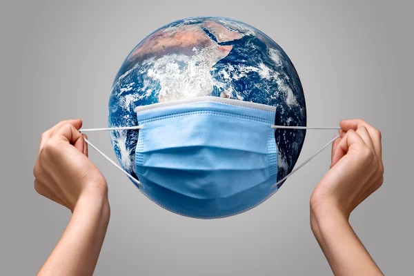 Ilustração do planeta terra usando máscara. Conceito de pandemia, doenças infecciosas. Metrópoles