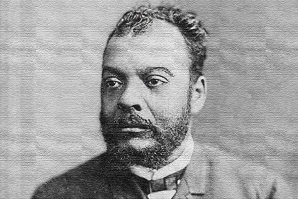 imagem em preto e branco de homem negro de barba - metrópoles