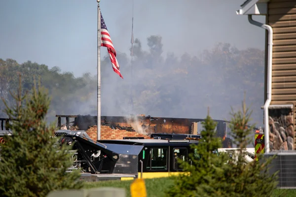 GRAND BLANC, MICHIGAN - SEPTEMBER 28: Emergency services respond to a shooting and fire at the Church of Jesus Christ of Latter-day Saints on September 28, 2025 in Grand Blanc, Michigan. Police said there are multiple victims and the shooter is down
