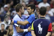NEW YORK, NEW YORK - SEPTEMBER 01: Novak Djokovic (R) of Serbia embraces Stan Wawrinka (L) of Switzerland after Djokovic retired due to a shoulder injury during their Men's Singles fourth round match on day seven of the 2019 US Open at the USTA Billie Jean King National Tennis Center on September 01, 2019 in Queens borough of New York City. (Photo by Matthew Stockman/Getty Images) NEW YORK, NEW YORK - SEPTEMBER 01: Novak Djokovic (R) of Serbia embraces Stan Wawrinka (L) of Switzerland after Djokovic retired due to a shoulder injury during their Men's Singles fourth round match on day seven of the 2019 US Open at the USTA Billie Jean King National Tennis Center on September 01, 2019 in Queens borough of New York City. (Photo by Matthew Stockman/Getty Images)