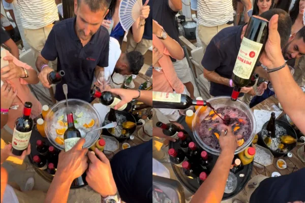 Foto colorida de várias pessoas fazendo drinque - Metrópoles