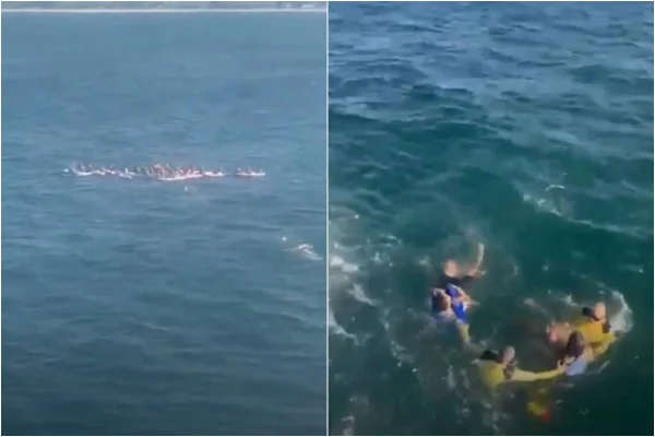 Foto colorida de resgate de pessoas em stand up paddle no Rio de Janeiro - Metrópoles