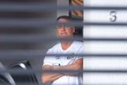 Bolsonaro a varanda de sua casa