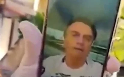Presidente Jair Bolsonaro (sem partido), em chamada com apoiadores durante carreata pró-governo em Cuiabá
