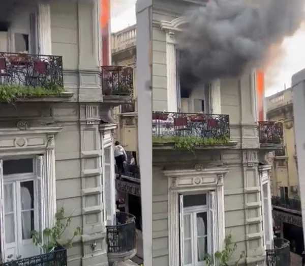 Imagem colorida de prédio pegando fogo em Buenos Aires, Argentina - Metrópoles
