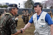 Mario Fernandes (esq.) e Jair Bolsonaro (dir.)