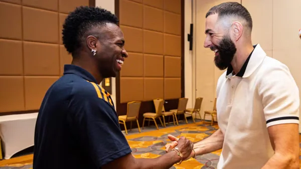Imagem colorida de Vini Jr e Benzema - Metrópoles