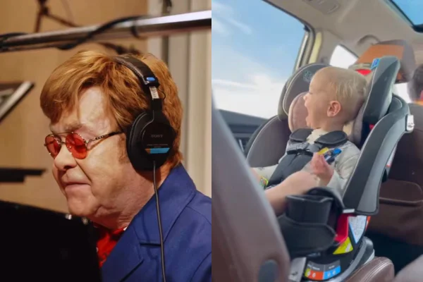 Foto colorida de Elton John e de um bebê - Metrópoles