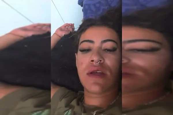 Mulher machucada e com piercing no nariz