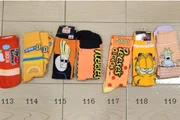 Parte da coleção laranja de meias de Rex