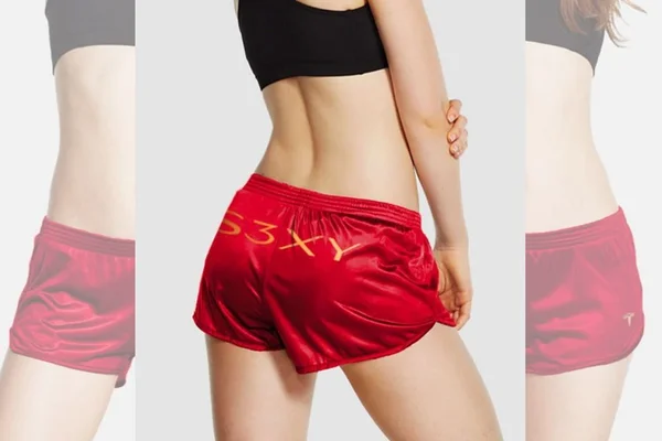 Modelo de costas, usando short vermelho e top preto