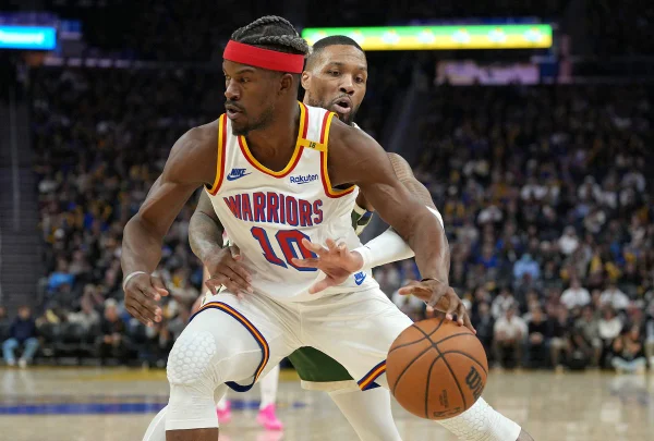 Imagem colorida de Jimmy Butler pelos Warriors - Metrópoles