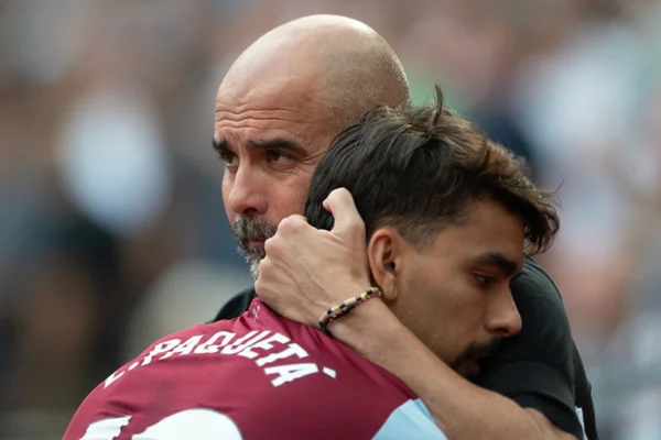 Imagem colorida de Lucas Paquetá abraçado com Pep Guardiola - Metrópoles