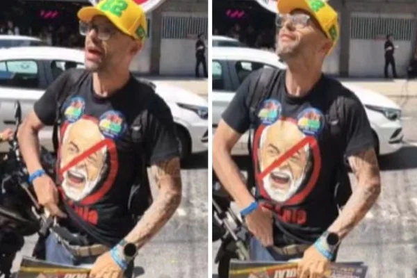 Foto colorida do deputado estadual Alexandre Knoploch (PL-RJ) mostrando arma de fogo durante uma confusão com integrantes da campanha do também deputado estadual Flávio Serafini (Psol-RJ) - Metrópoles