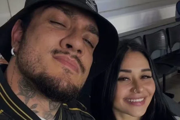 Foto colorida de MC Binn e Ana Laura Marques - Metrópoles