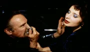 Veludo Azul. Frank Booth, transa com Dorothy Vallens, enquanto usa uma máscara de gás