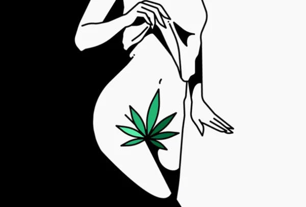 mulher com flor de maconha