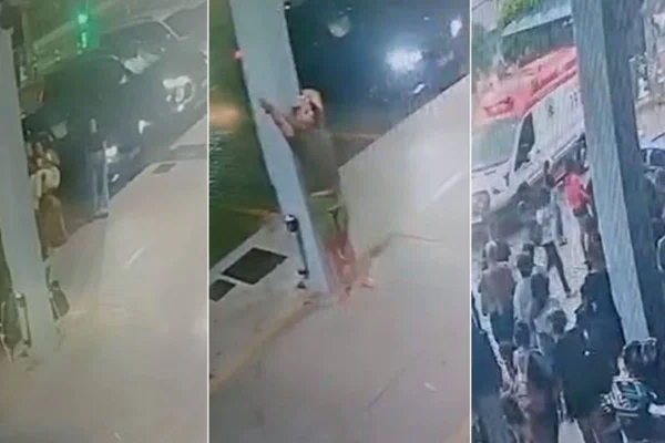 Foto colorida de jovens fora da BMW passando mal em Balneário Camboriú - Metrópoles