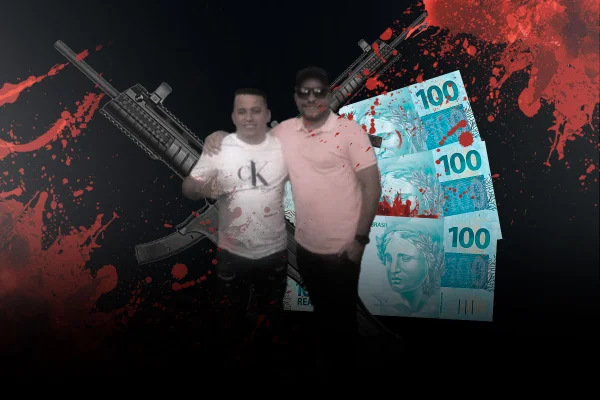 Dois homens abraçados, no centro. Ao fundo, três gigantes notas de R$ 100 e fundo preto, com manchas de sangue - Metrópoles