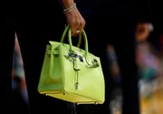 LOS ANGELES, CALIFORNIA - APRIL 7: Rapper Megan Thee Stallion holding her Birkin bag arrives to attend a game between the Minnesota Timberwolves and Los Angeles Lakers at Crypto.com Arena on April 7, 2024 in Los Angeles, California. NOTE TO USER: User expressly acknowledges and agrees that, by downloading and or using this photograph, User is consenting to the terms and conditions of the Getty Images License Agreement. (Photo by Kevork Djansezian/Getty Images) LOS ANGELES, CALIFORNIA - APRIL 7: Rapper Megan Thee Stallion holding her Birkin bag arrives to attend a game between the Minnesota Timberwolves and Los Angeles Lakers at Crypto.com Arena on April 7, 2024 in Los Angeles, California. NOTE TO USER: User expressly acknowledges and agrees that, by downloading and or using this photograph, User is consenting to the terms and conditions of the Getty Images License Agreement. (Photo by Kevork Djansezian/Getty Images)