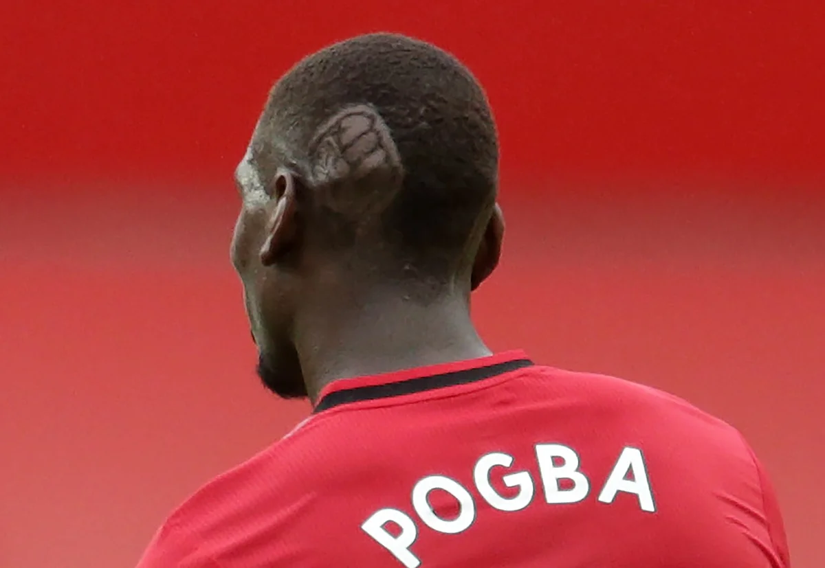 Paul Pogba demonstrou como os cortes de cabelo podem transmitir mensagens Paul Pogba demonstrou como os cortes de cabelo podem transmitir mensagens