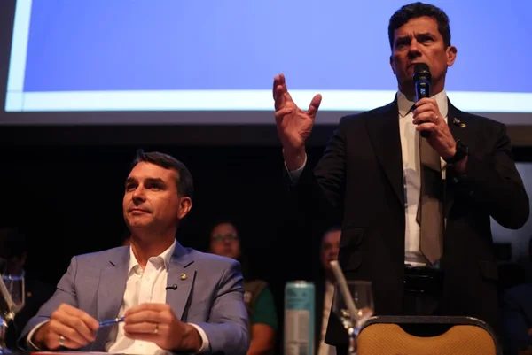 Imagem colorida de Sergio Moro e Flávio Bolsonaro - Metrópoles