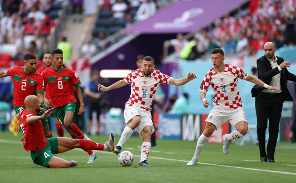 Marrocos e Croácia atuando pela Copa do Mundo - Metrópoles