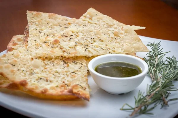 Aprenda a receita da focaccia com parmesão de Carole Crema