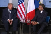 O presidente dos EUA, Donald Trump, em reunião com o presidente francês, Emmanuel Macron
