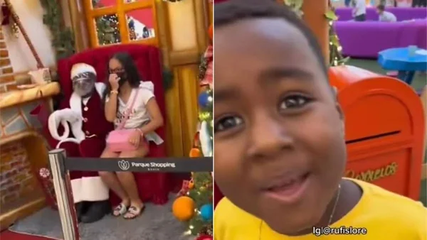 Criança se emociona ao encontrar Papai Noel negro: “Da minha cor”