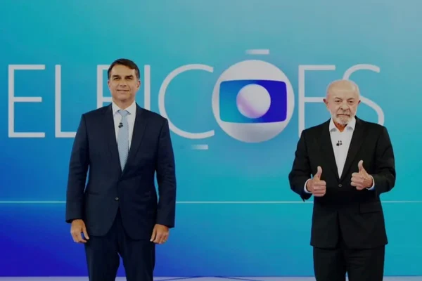 Flávio Bolsonaro e Lula durante debate na TV Globo - Metrópoles