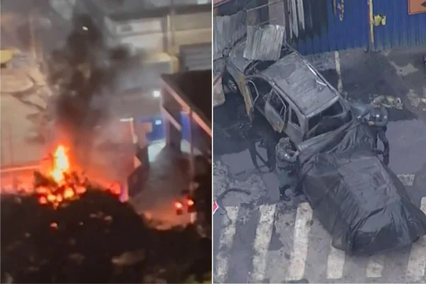 Imagem colorida mostra incêndio em viatura após perseguição. Metrópoles