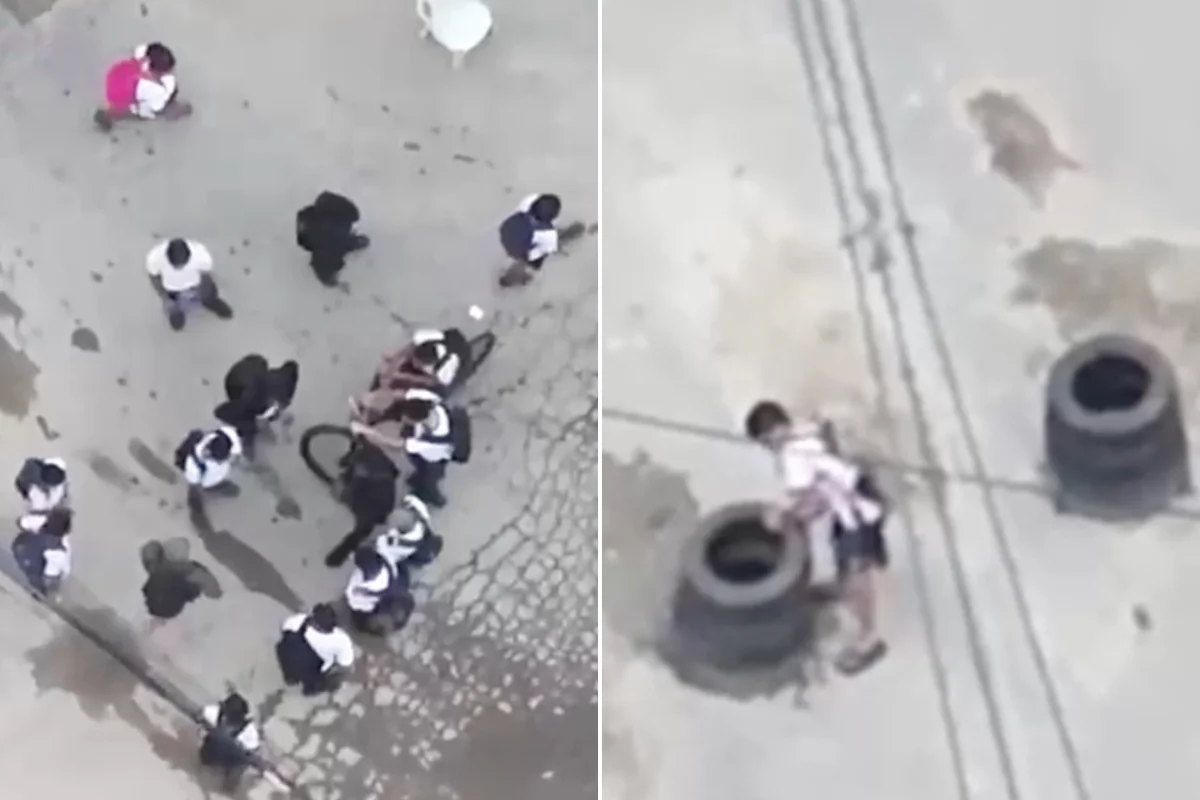 Drone flagra alunos com traficante de fuzil e ajudando a erguer barricadas
