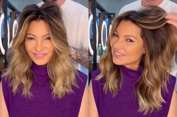 A primeira-dama eleita, Janja, sorri e exibe seu novo visual sentado em frente a Ulisses Petri, do salão ROM Concept, seu cabeleireiro. Ele sacode o cabelo dela, loiro com tons escuros na raiz e levemente ondulado - Metrópoles