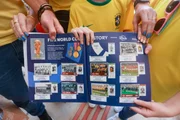 Colecionadores trocam figurinhas da Copa do Mundo na Arena das Figurinhas, na Arena Mané Garrincha.