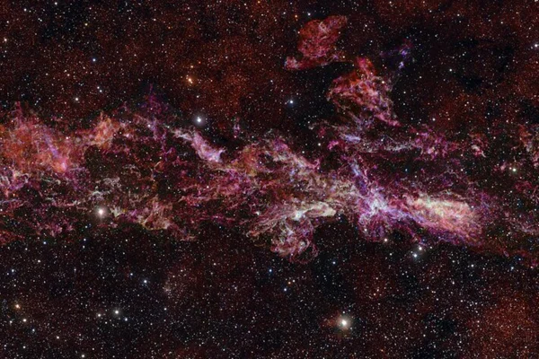 Imagem colorida sobre a Zona Molecular Central (ZMC) da Via Láctea - Metrópoles