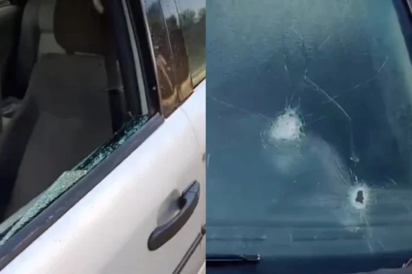 Imagem colorido mostra carro com marcas de disparo de arma de fogo - Metrópoles