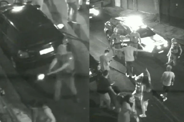Imagem em preto e branco de abordagem policial
