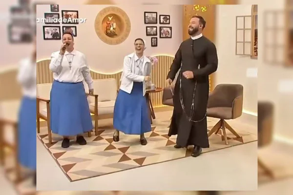 Imagem colorida de freiras dançando