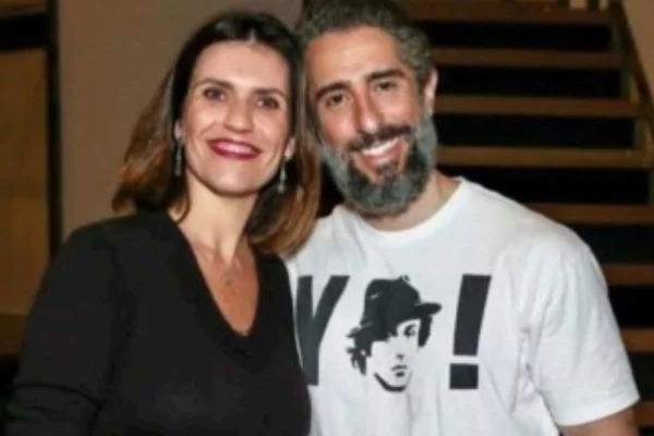 Foto colorida de Assessora Cintia Araium e Marcos Mion - Metrópoles