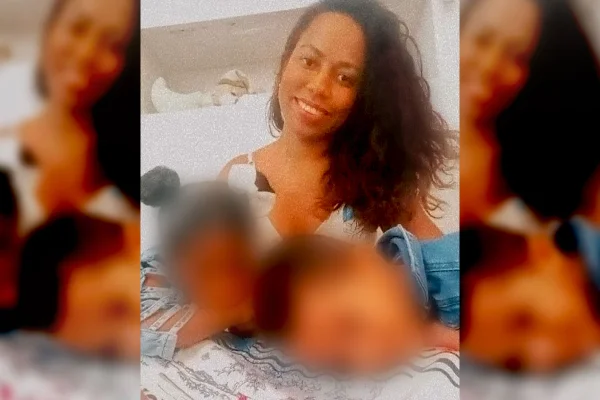 Imagem colorida de mulher sorrindo, no centro, com crianças ao lado - Metrópoles
