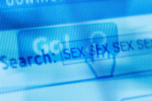 Foto colorida da tela de um computador escrito "sex sex sex"-Metrópoles
