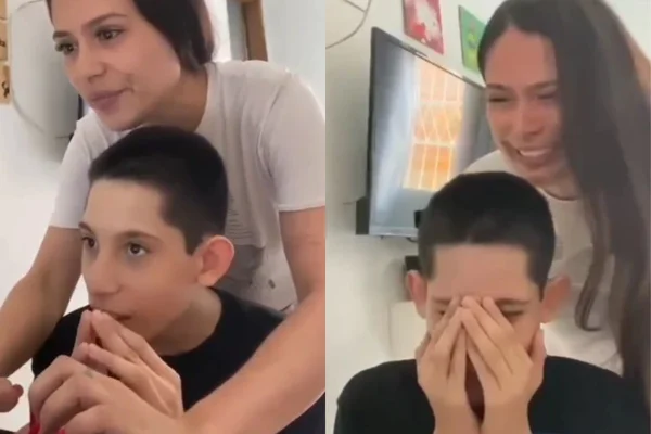 Foto colorida de uma mulher com um menino sentado - Metrópoles