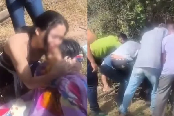 Imagem colorida, mulher resgatada de uma cisterna. Ao redor, populares, - Metrópoles